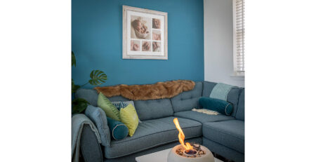 Multi aperture Newborn framed photograph shown in home.